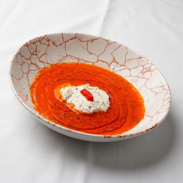 Queso De Cabra en Salsa De Piquillos.