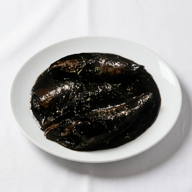Chipirones Rellenos en Su Tinta.